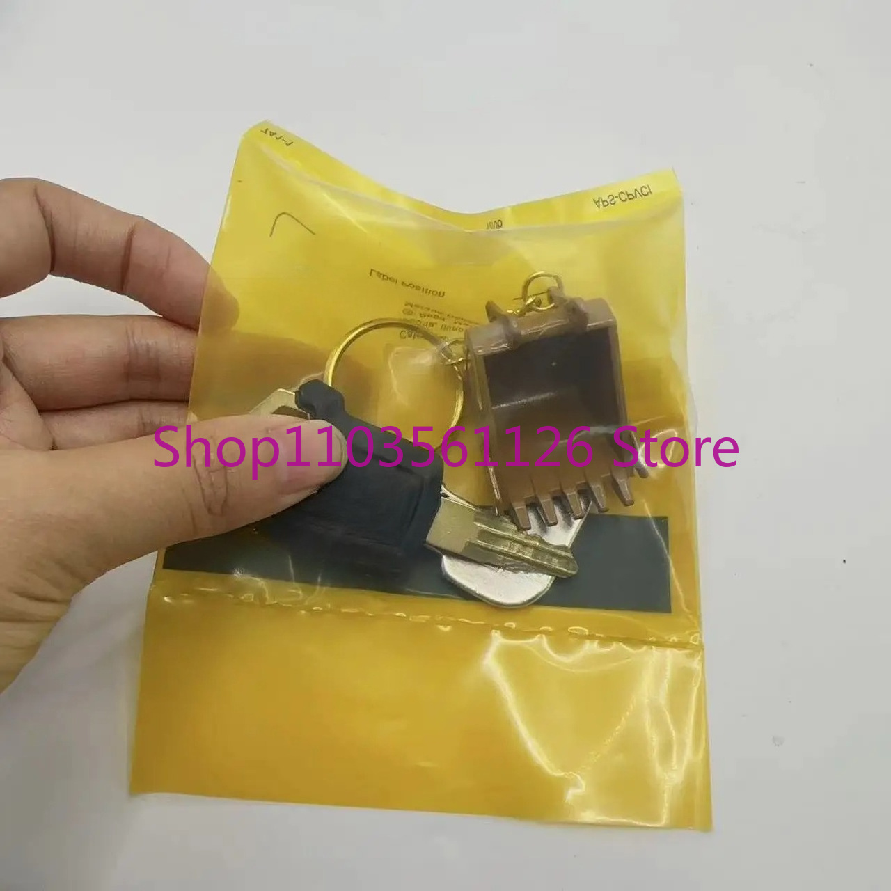 5P8500 8H5306 with Bucket Key  - Heavy Equipment Keychain recension och pris